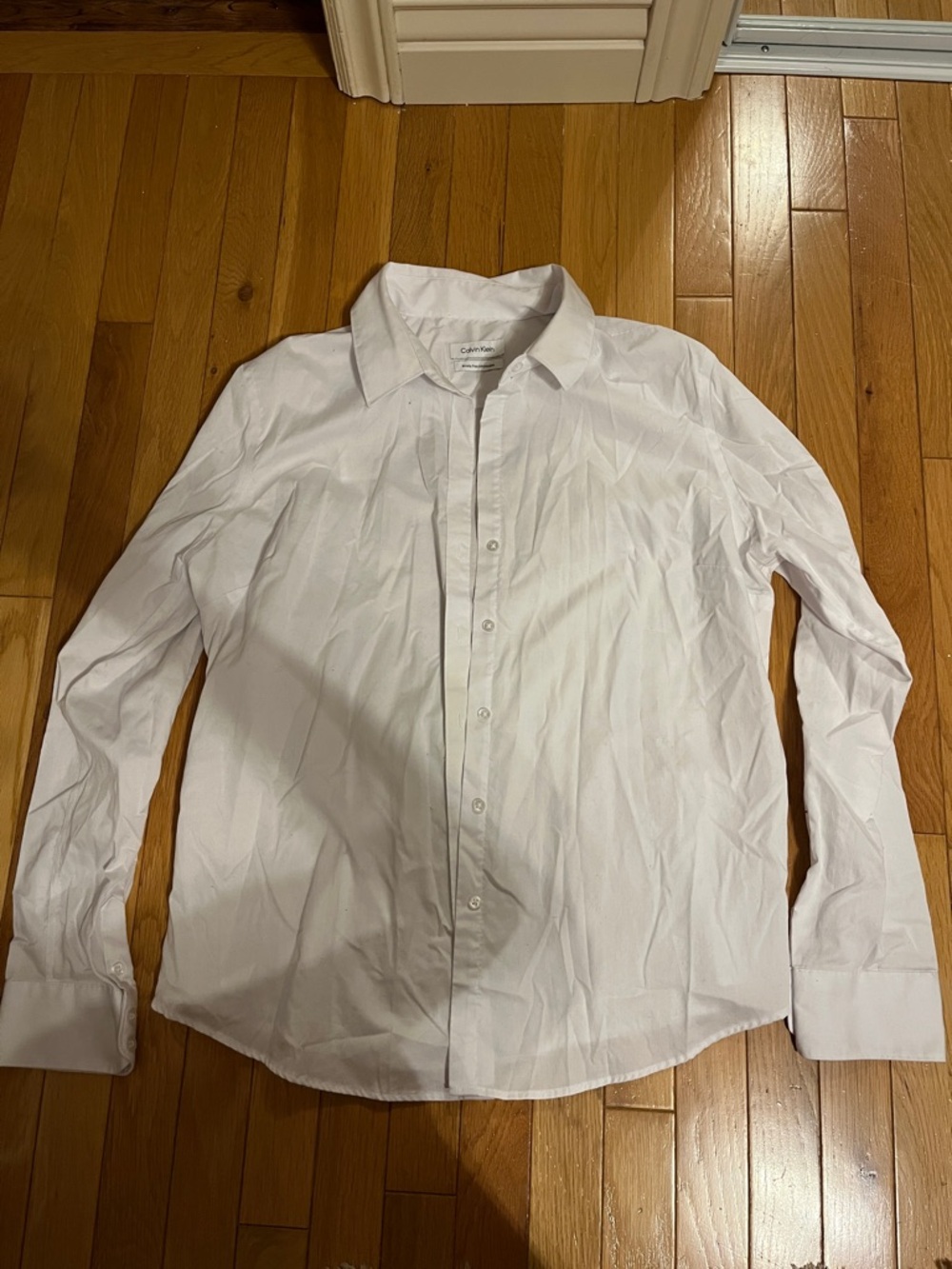 Calvin Klein white button up long sleeve top